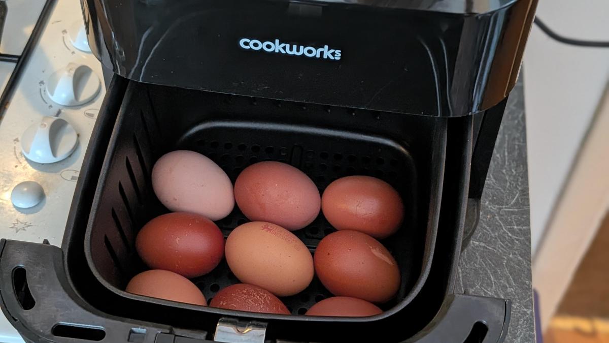 Brown eggs arranged in the air fryer basket