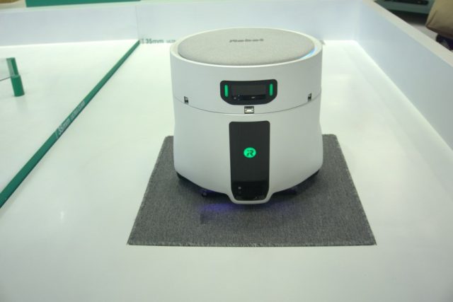 I Watched a Floor Washing Robot Mothership Deploy a Roomba Using a Mechnical Arm